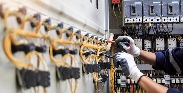 Professional Electrician technician working in Hartselle, AL